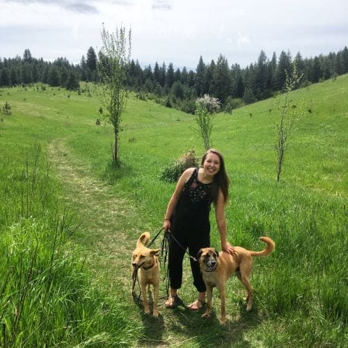 WSU anthropology Ph.D. student Jaime Chambers with her dogs Chalo and Priya on International Women’s Day