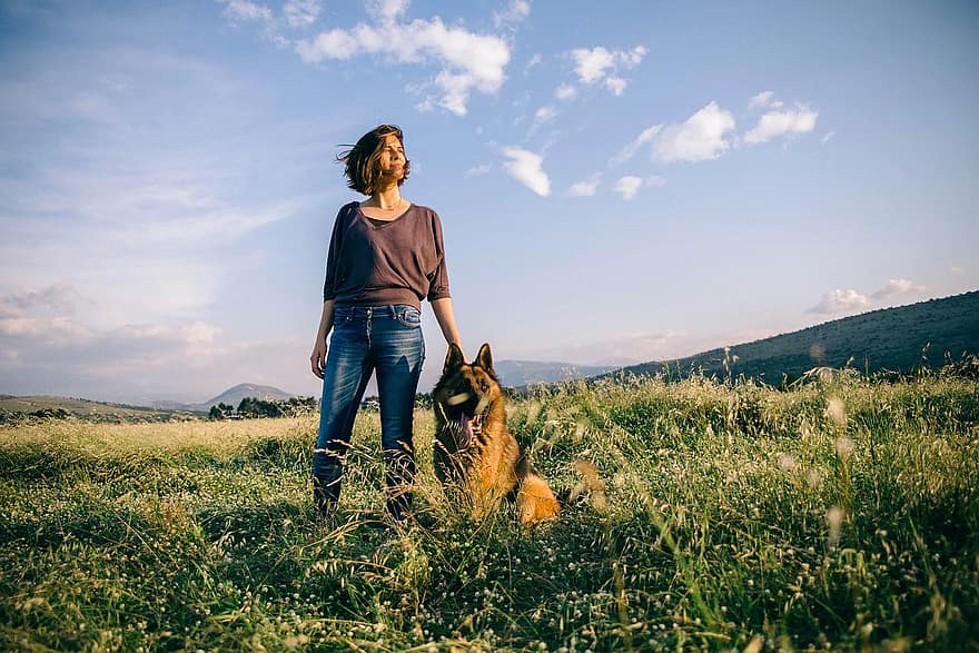 This German Shepherd gets lots of exercise and training with their mum - a PD Insurance customer!