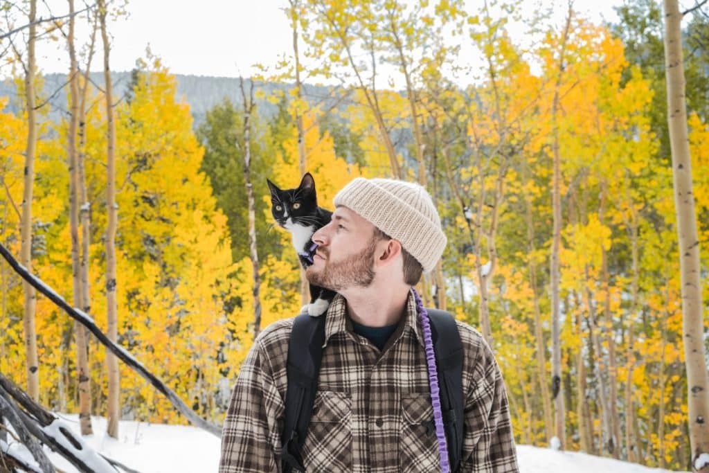 Man hiking with his pet