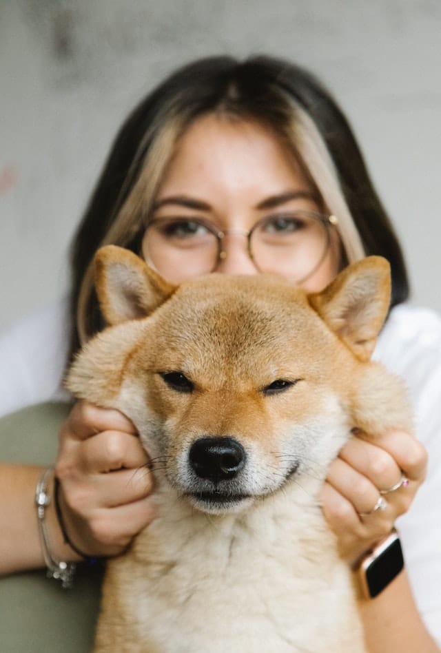 a woman with her dog - she's one of the people who look like their dogs