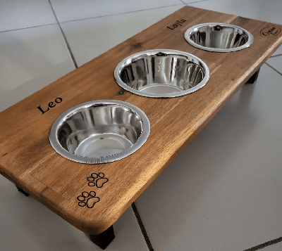 Gifts for dogs NZ and things to buy to spoil your dog A wooden dog bowl stand.