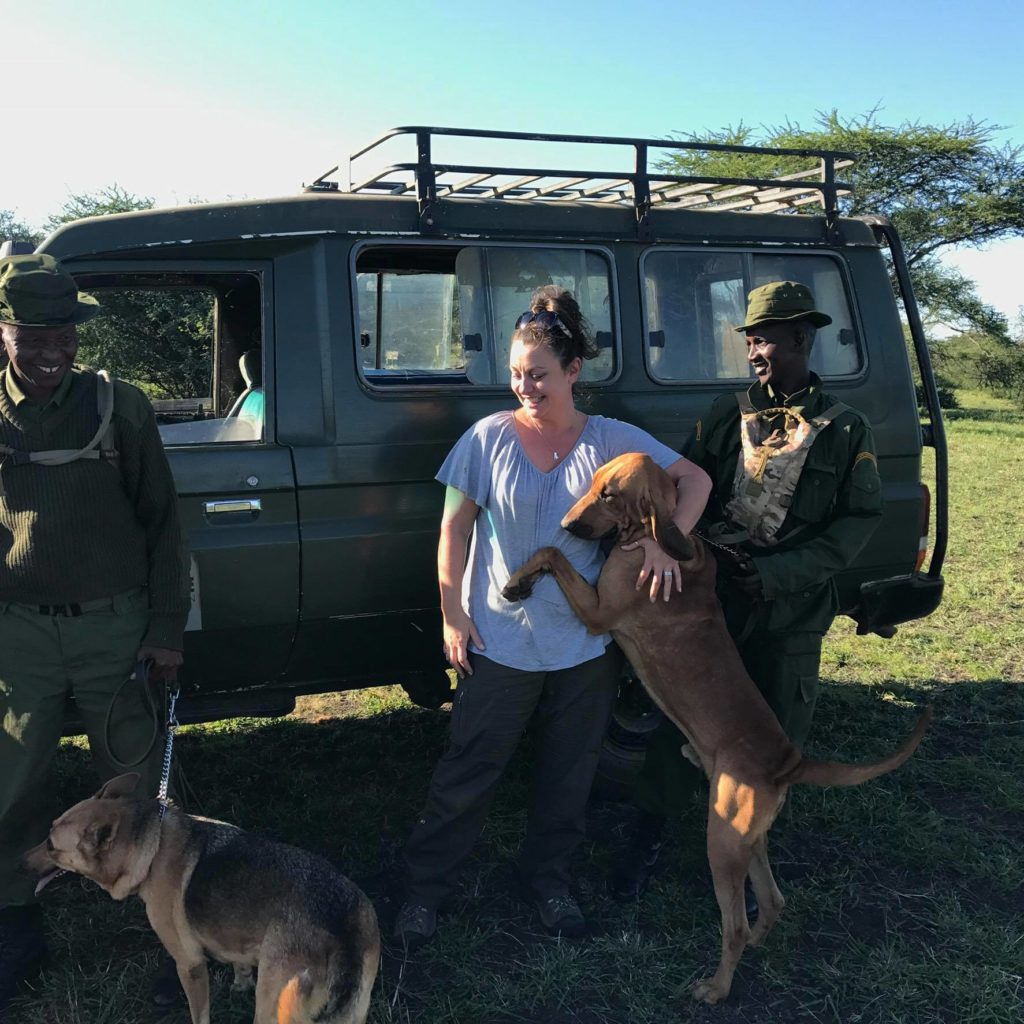 NZ dog trainer with trackers and their dogs in Kenya, Africa