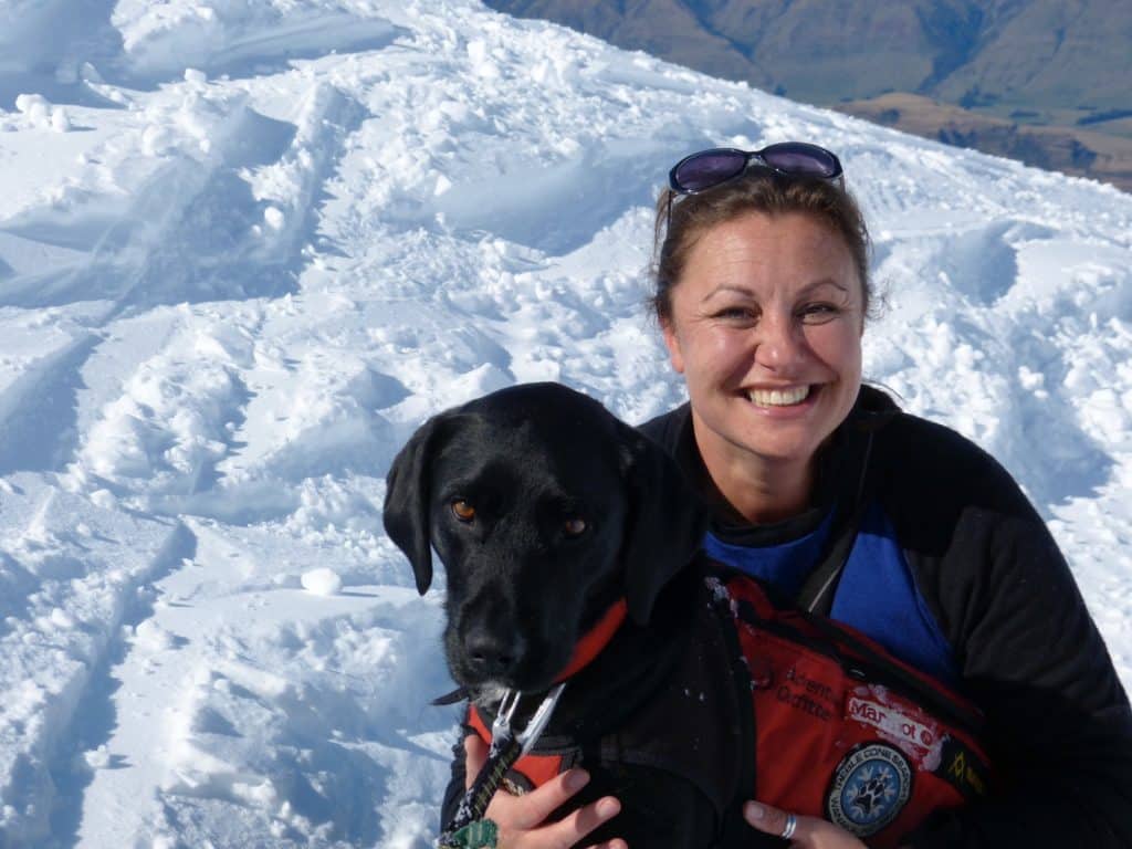Maria Alojaman doing stress relief with a dog