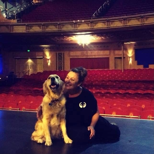 Maria Alojaman with a dog she is training 