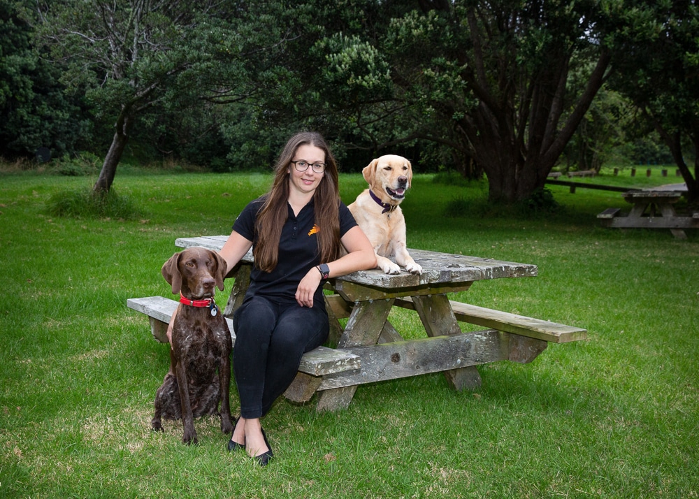 PD pet insurance business development manager, Jacqui sitting with her dogs