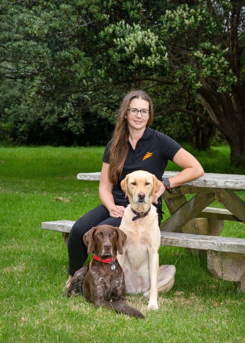 PD pet insurance business development manager, Jacqui sitting with her dogs