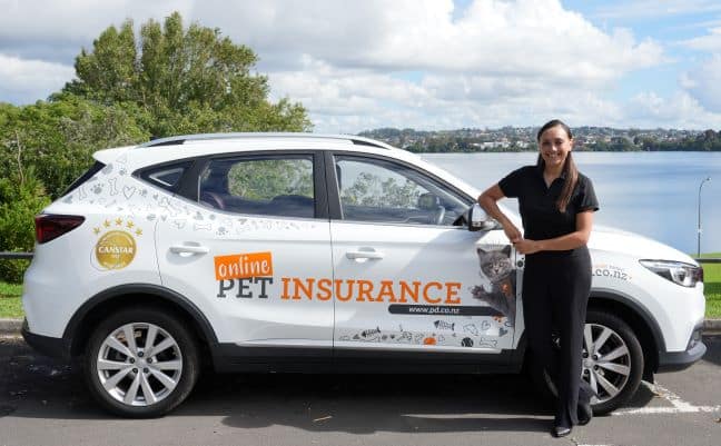 PD BDM, Danielle Rutherford, stands in front of her PD Pet Insurance vehicle in Auckland