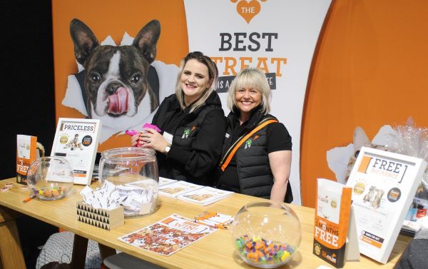 Michelle Le Long, COO at PD Insurance co-hosts the PD stand with Victoria at the Auckland Pet Expo