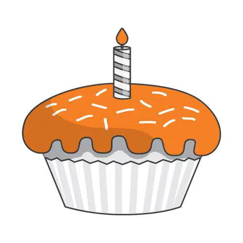 A cupcake with orange icing, white sprinkles, and a single lit candle on top in a white paper wrapper—perfect for celebrating PDTurns5 with fellow Pet Parents.